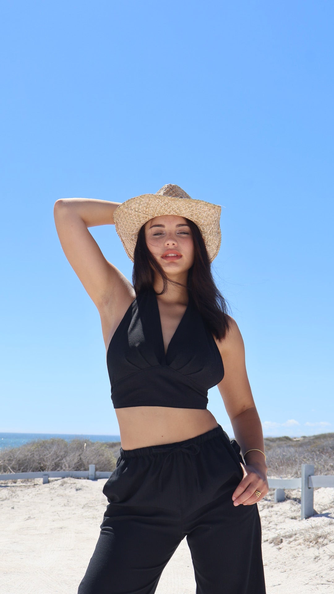 Black linen halter wrap top with adjustable ties and cropped fit for women