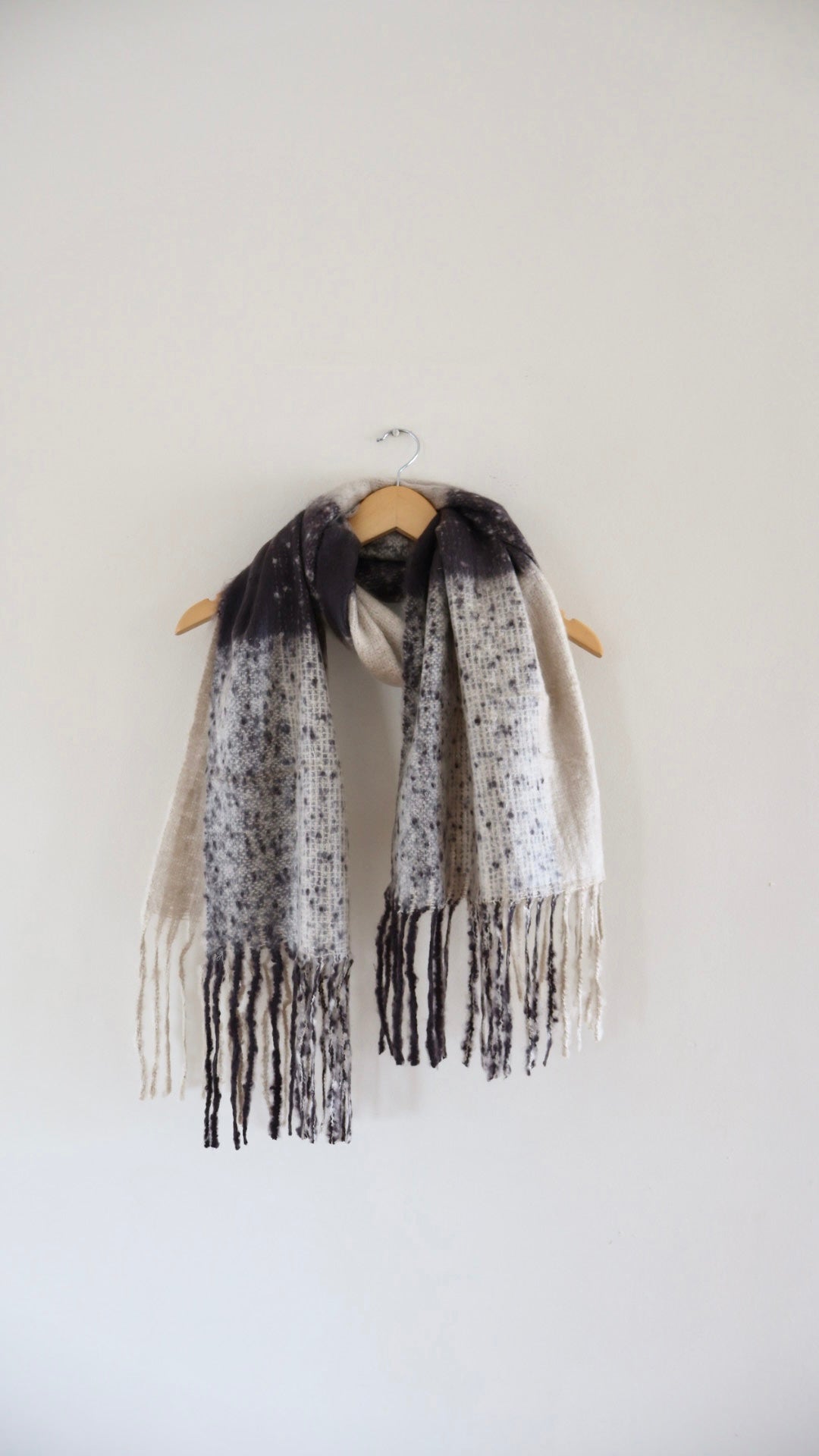 Chunky brown scarf made from soft viscose with a breathable knit and draped silhouette