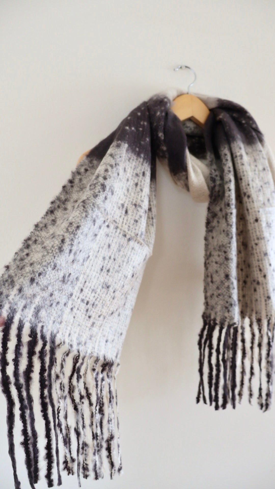 Chunky brown scarf made from soft viscose with a breathable knit and draped silhouette
