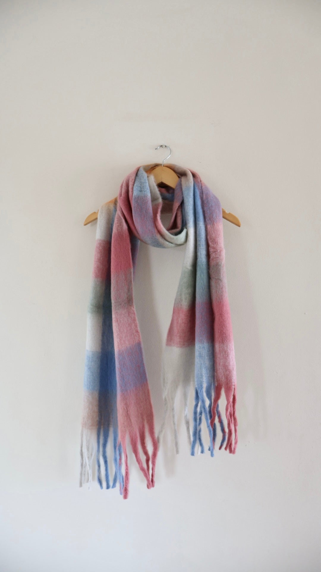 Chunky knit winter scarf in bright, colourful tones with oversized design for warmth and comfort