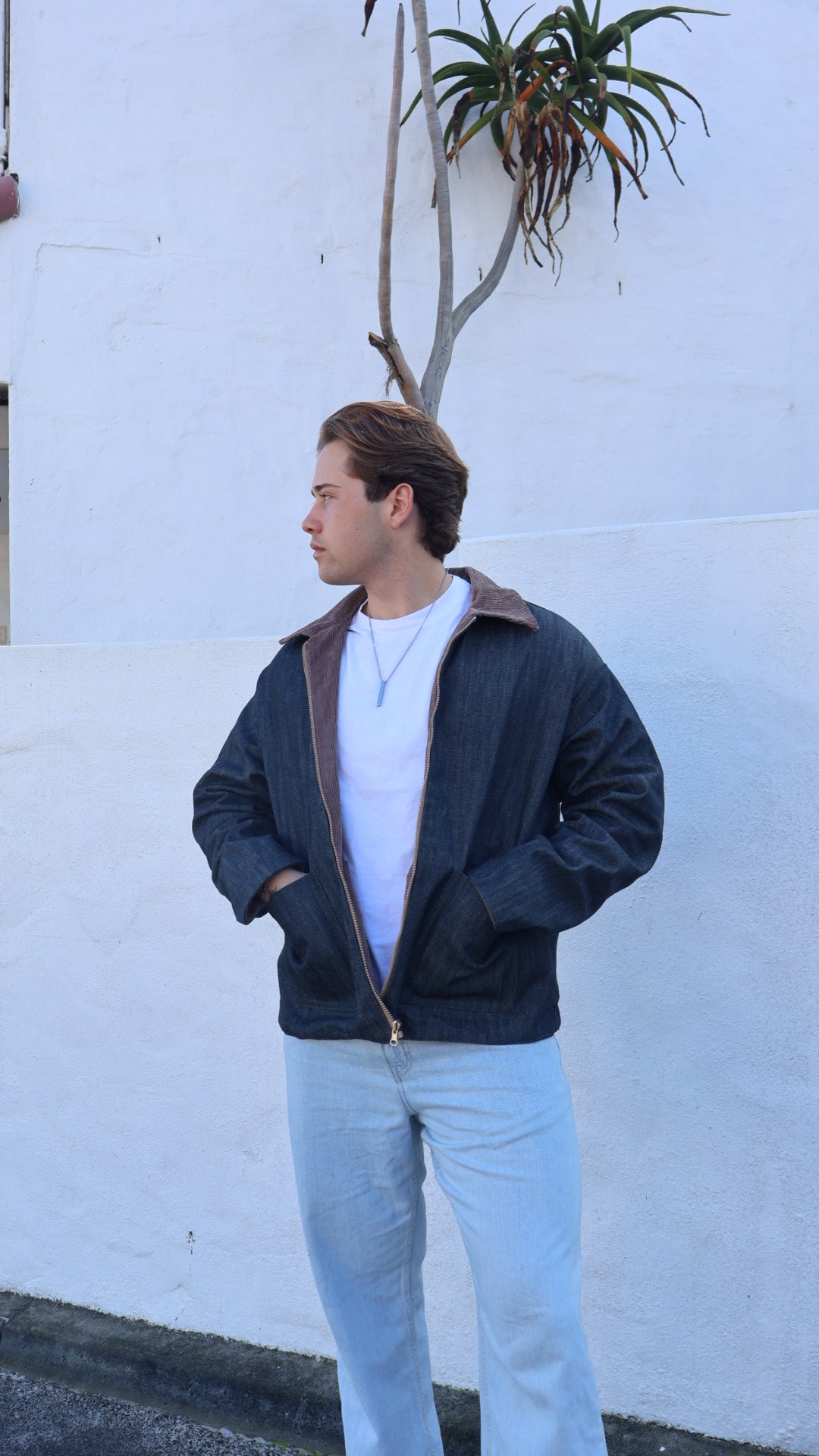 Japanese denim side of reversible jacket with white background.