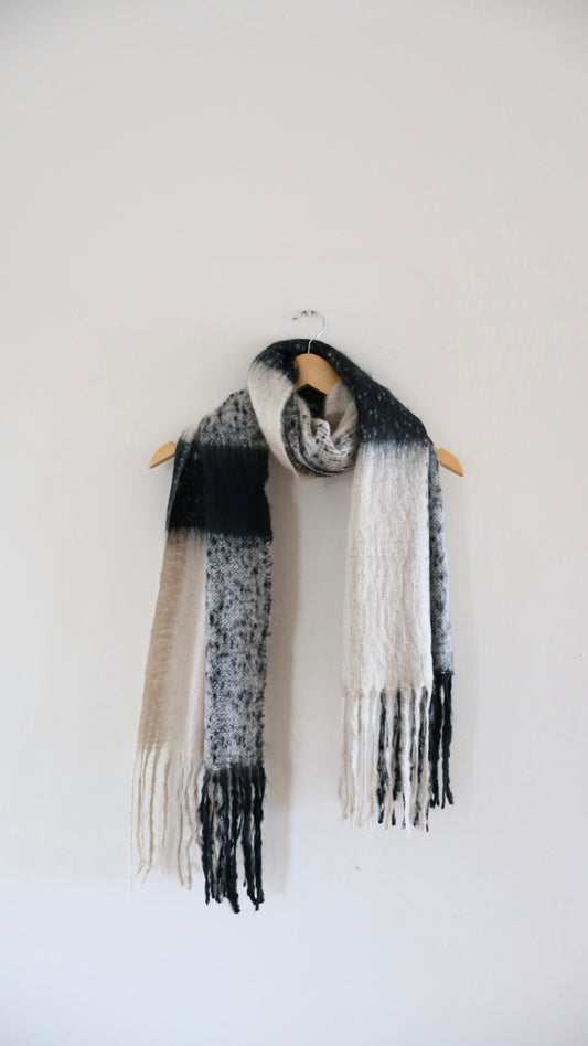 Chunky knit scarf made from viscose, designed for warmth and minimalist styling