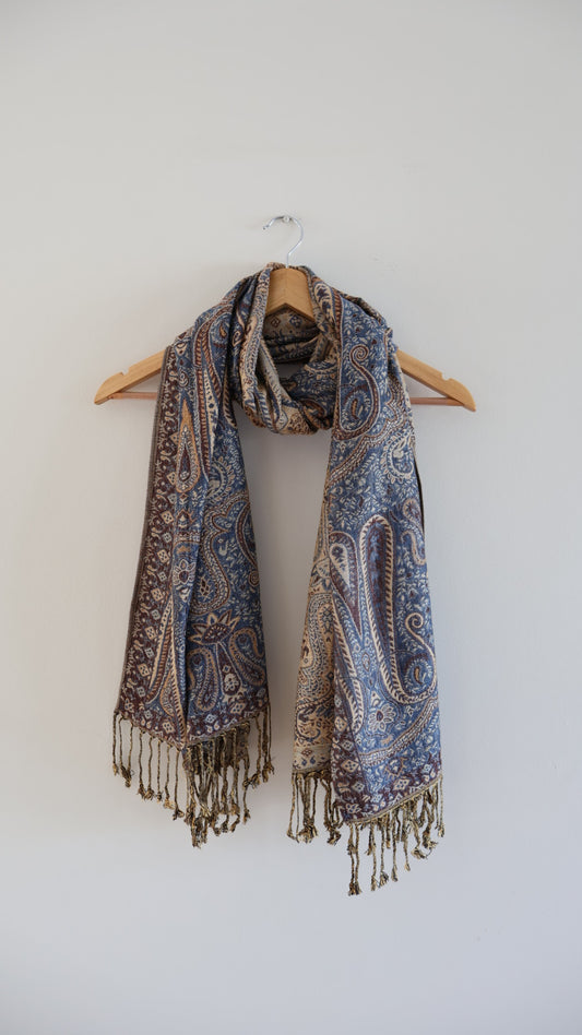 Blue Maroon boho festival pashmina scarf draped on a hanger