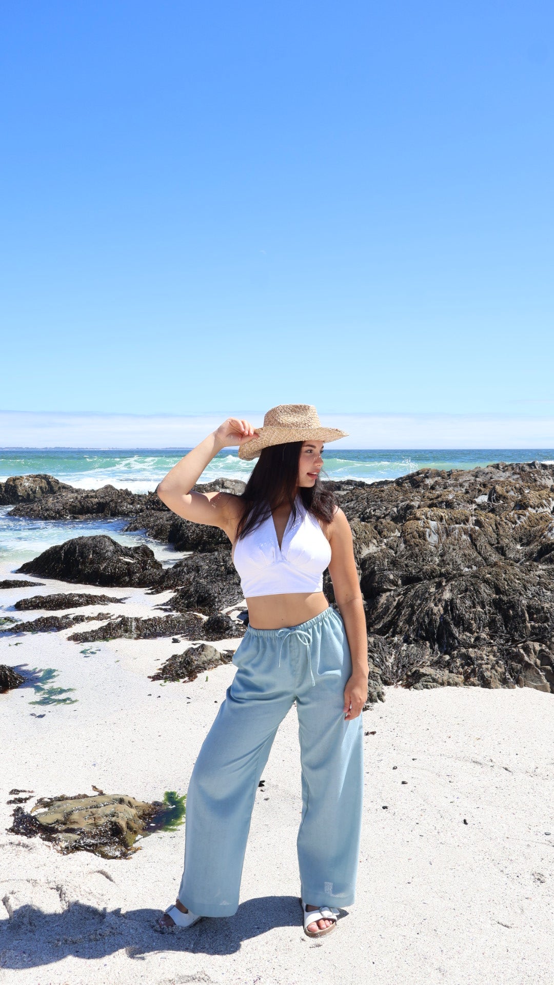 Blue linen pants with a relaxed straight-leg cut and side pockets for women

