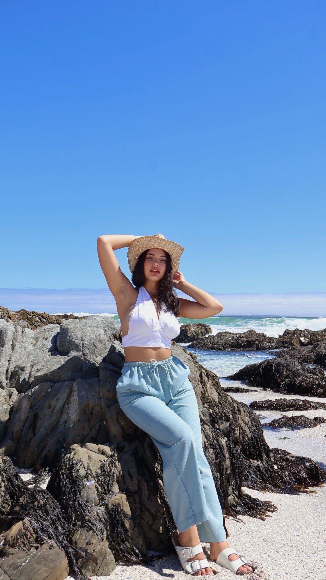 Blue linen pants with a relaxed straight-leg cut and side pockets for women

