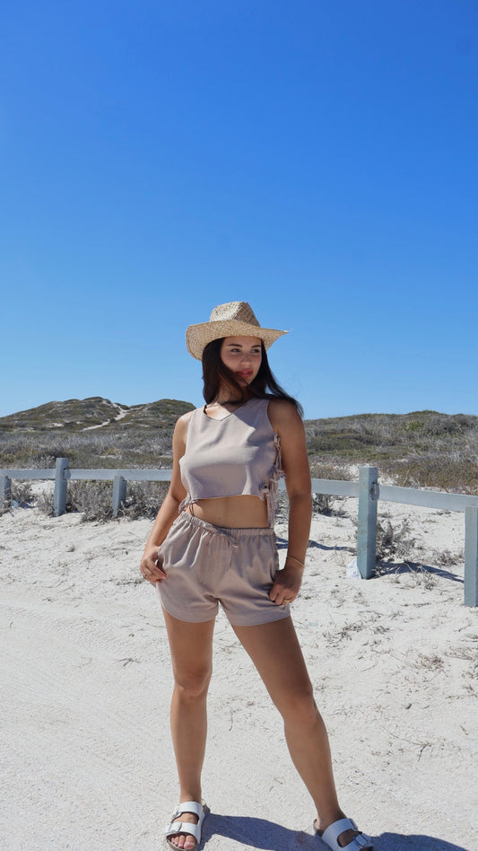 Soft women’s linen shorts with relaxed fit, styled with a linen top.