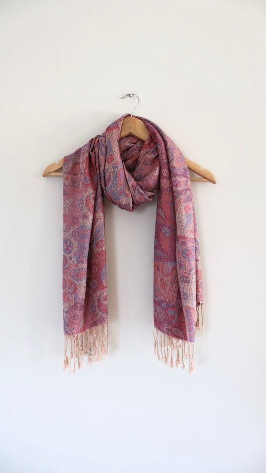Paisley Pink boho festival pashmina scarf draped on a hanger