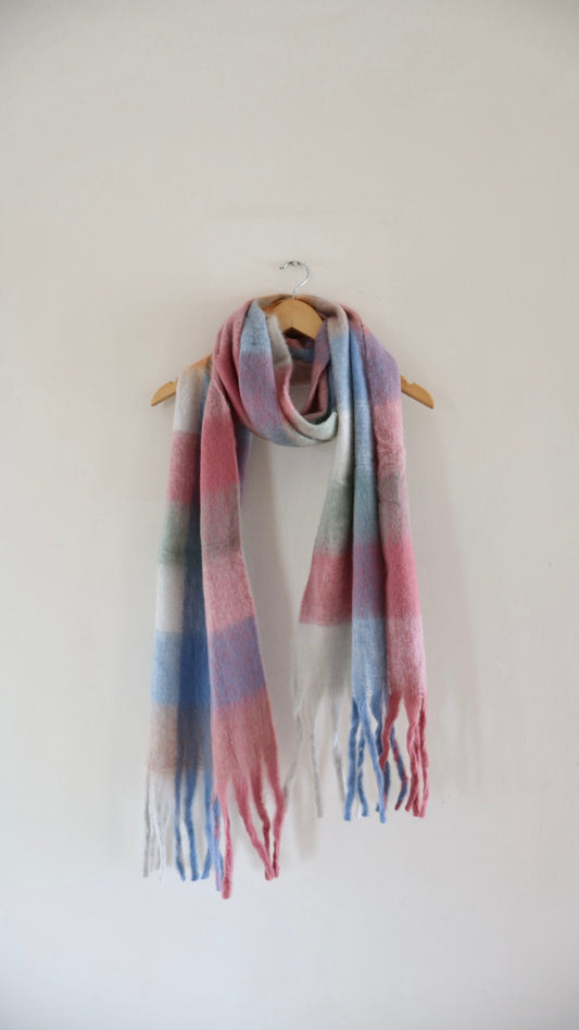 Chunky knit winter scarf in bright, colourful tones with oversized design for warmth and comfort

