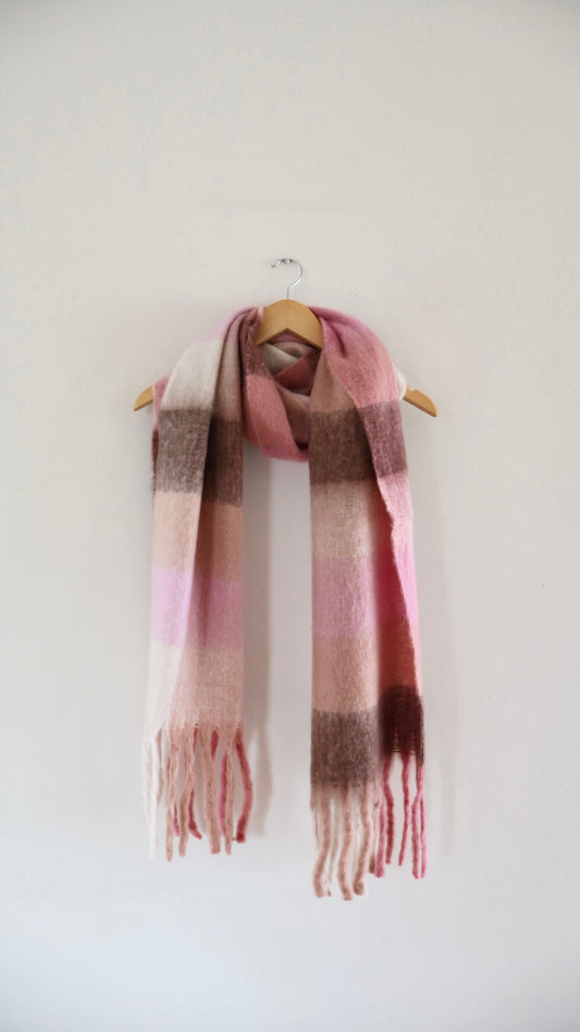 Chunky knit winter scarf in bright, colourful tones with oversized design for warmth and comfort

